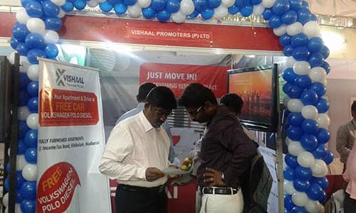 Visitor interaction at Vishaal Promoters real estate exhibition stall