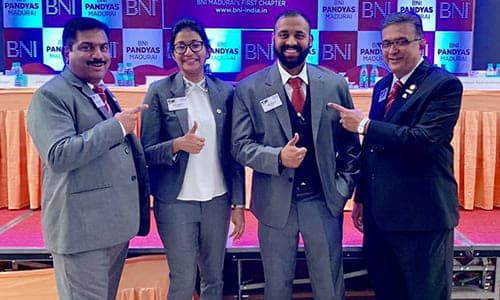 Business networking members posing together at professional meeting event