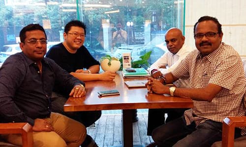 Business discussion meeting with international partners at office