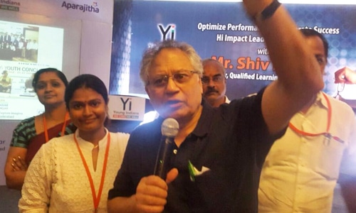 Delegates posing together during a real estate and infrastructure conference