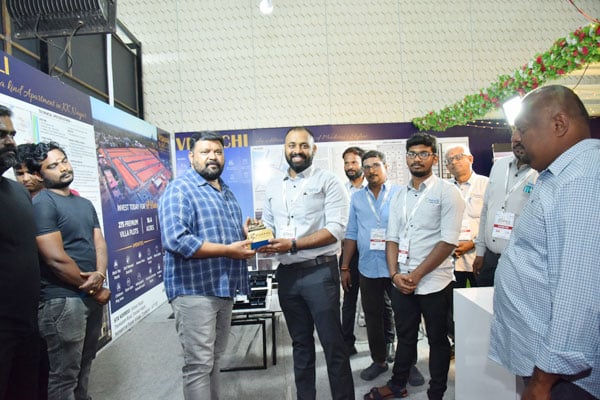 Vishaal Promoters team receiving award at property exhibition