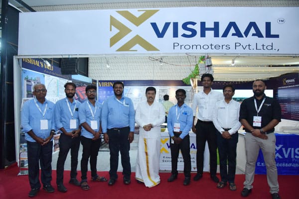 Vishaal Promoters team at real estate exhibition stall