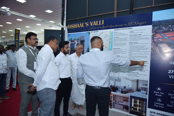 Vishaal Promoters team explaining project details to visitors